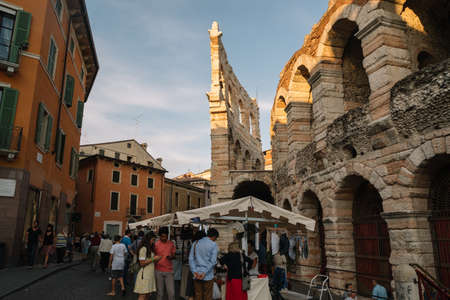 Verona, Italy - August 12, 2016: Tourists near the Verona Arena. This is a Roman amphitheatre in Piazza Bra in Verona, Italy.のeditorial素材