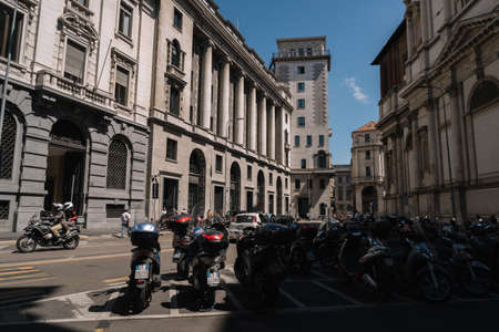 Milan, Italy - August 11, 2016: Motorcycle parking near the San Fedele Square in Milan, Italy.のeditorial素材