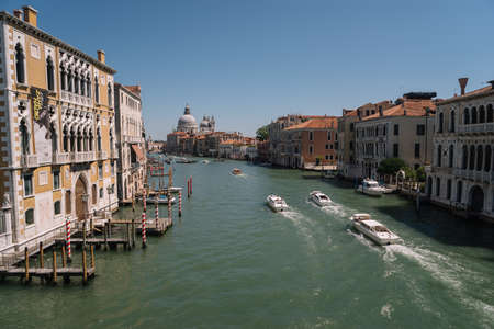 Venice, Italy - August 14, 2016: Boats goes along the Grand Canal towards San Simeone Piccolo church in Venice, Italy.のeditorial素材
