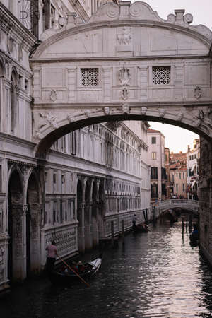 Venice, Italy - August 14, 2016: Boats and people near the Bridge of Sighs (Italian: Ponte dei Sospiri) is a bridge in Venice, Italy.のeditorial素材