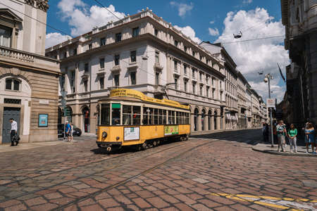 Milan, Italy - August 11, 2016: Yellow tram rides along Piazza della Scala in Milan, Italy.のeditorial素材