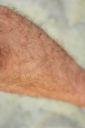 Close-up detail of human skin showing natural texture and tone in soft natural lightingの写真素材