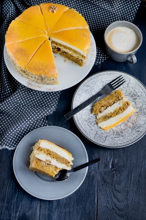 Carrot cake on the black wood deskの写真素材