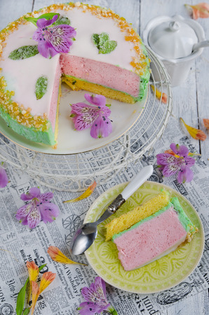 Cake with strawberry mousse and fresh basilの写真素材