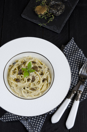 Spaghetti with fresh black truffle and cream sauceの写真素材