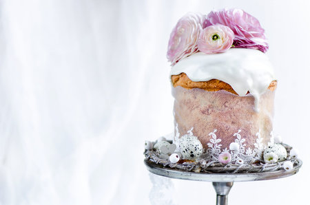 Traditional easter cake decorated with icing and flowers