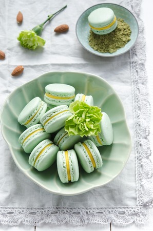 Makarons matcha with tea and mango ganacheの写真素材