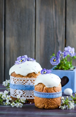Traditional easter cake decorated with icing and flowersの写真素材