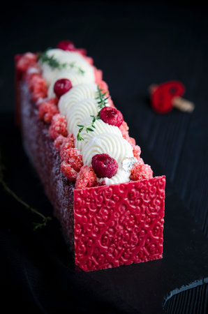 Beetroot velvet cake with goat cheese cream and raspberries