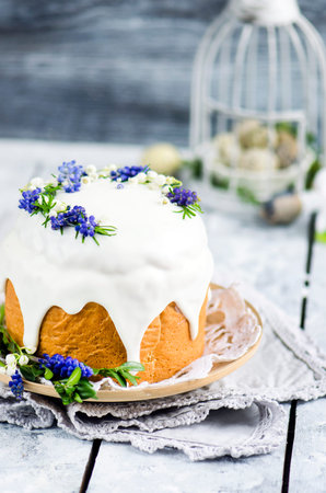 Traditional easter cake decorated with icing and flowers