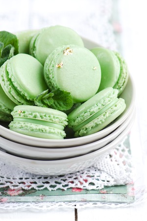 Green macaron with fresh mint ganache and white chocolateの写真素材