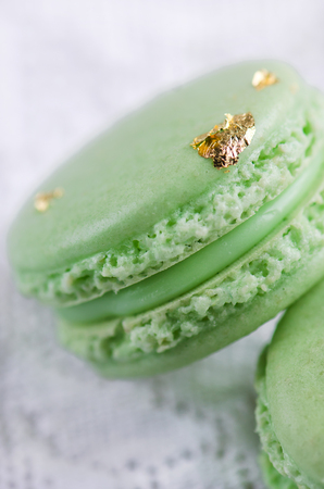 Green macaron with fresh mint ganache and white chocolateの写真素材