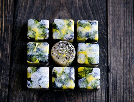 Handmade luxury chocolate with passion fruit ganacheの写真素材