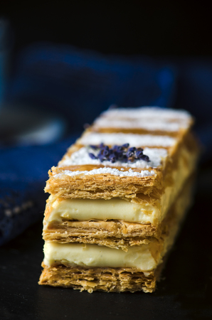 Millefeuille, french pastry on a wooden dark backgroundの写真素材