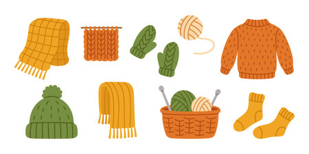 Vector set of cozy knitted items and yarn in flat style. Collection of scarves, sweater, socks, mittens, hat, yarn balls, and basket with knitting needles. Handmade wool winter clothing illustration.のイラスト素材