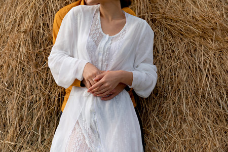 Intimate wedding at the nature romantic couple next to the haystackの写真素材