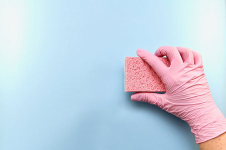 Pink household glove. Holds horizontally.