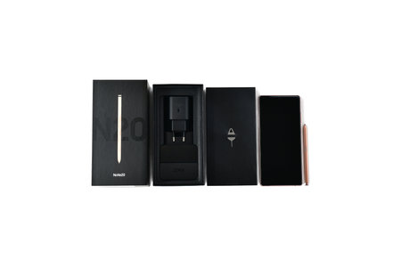Surgut, Khanty-Mansiyskiy avtonomnyy okrug, Russia - December 27, 2020: Samsung Galaxy Note 20 smartphone bronze. Delivery set, packaging, box, power supply plug, mobile phone panel, edgector, stylus.のeditorial素材