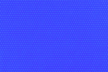 Textile homogeneous background color blue electrician in white fine polka dots, horizontal pattern. View from above. Emotionally deep mystical bright.の写真素材