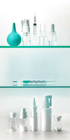 Pharmacy medicines on the shelves. Bottles and medical care items.の写真素材