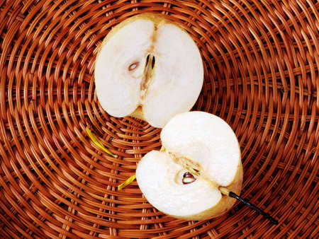 Fresh juicy pear in the basketの写真素材