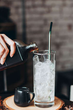 iced coffee cube in glass with milkの写真素材