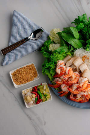 Top view of japanese shabu shabu with prawns