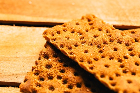 fresh buckwheat crackers on a wooden background.の写真素材