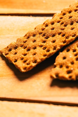 fresh buckwheat crackers on a wooden background.の写真素材