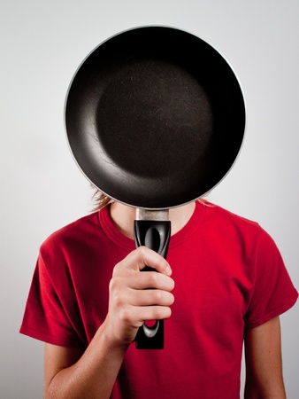 child whit frying panの写真素材