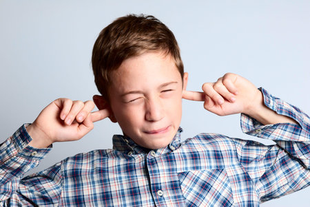 child that the ears are covered