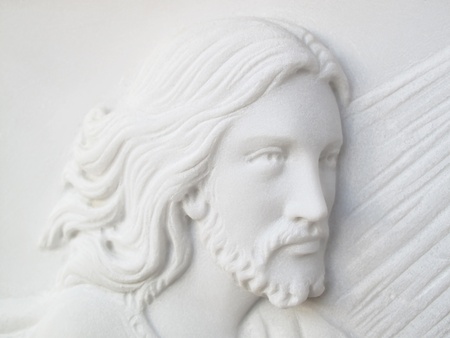 jesus christ on white marble tombstoneの写真素材