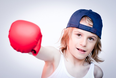child with boxing glovesの写真素材