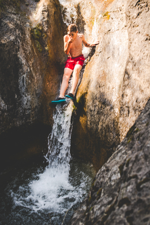summer fun at the small riverの写真素材