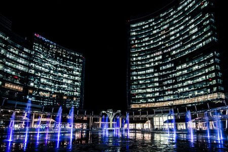 MILAN, ITALY - FEBRUARY 04,2016: Milan Porta Garibaldi district. The Unicredit Bank skyscraper and Piazza Gae Aulenti.Night scenes.のeditorial素材