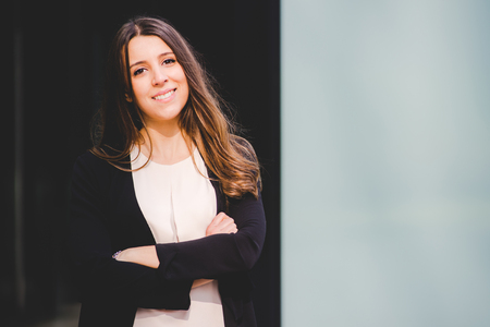 young authentic business woman in the city for a buisness tripの写真素材