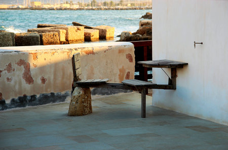 Special chair with a table of a house by the sea in marzamemiの写真素材