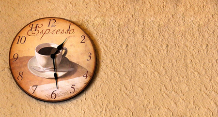 Coffee clock on a wallの写真素材