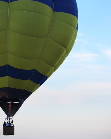 an hot-air balloon during a flightの写真素材