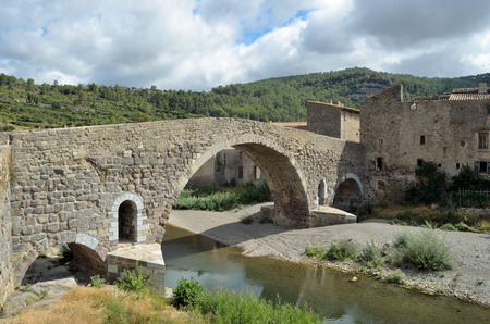 Historic medieval bridge at Lagrasse Languedoc Franceの写真素材