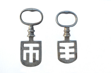 Two Antique French Night Latch Keys on a white backgroundの写真素材