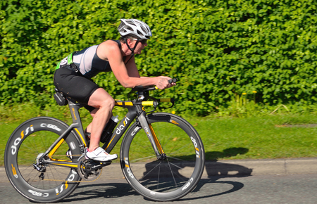 Female triathlete on Cycling stage.のeditorial素材