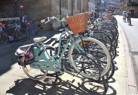 Bicycles parked in Cambridge Trinity Street.のeditorial素材