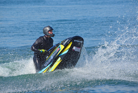 WYBOSTON, BEDFORDSHIRE, ENGLAND -  APRIL 09, 2017: Freestyle Jet Skier performing . in competition.のeditorial素材