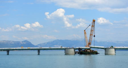 Construction of the bridge to the island of Äiovo from the mainland near Trogir Split Croatia.の写真素材