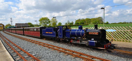 WROXHAM, NORFOLK, ENGLAND - MAY 11, 2018:  Blickling Hall Narrow Gauge Steam Train at Wroxham Station on the Bure Valley Railway Norfolk.のeditorial素材