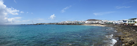 Panorama of Playa Blanca seafront Lanzarote.