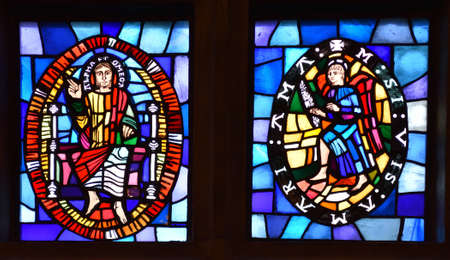 UPPER DICKER, EAST SUSSEX, ENGLAND - MAY 17 , 2019: Stain Glass Window in Mitchelham Priory Upper Dicker East Sussex England.のeditorial素材