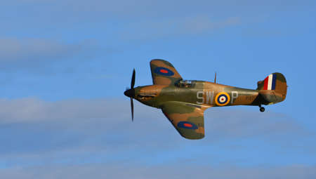 ICKWELL, BEDFORDSHIRE, ENGLAND - SEPTEMBER 06, 2020: Hawker Hurricane Mark 1 (serial P3717)  World War 2 aircraft in flightのeditorial素材