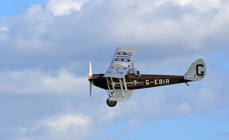 ICKWELL, BEDFORDSHIRE, ENGLAND - SEPTEMBER 06, 2020: Vintage De Havilland DH51  "Miss Kenya" biplane  Aircraft in flight.のeditorial素材